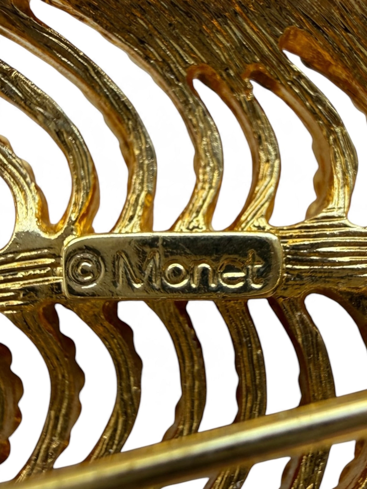 Vintage Monet Gold Tone Openwork Feather Brooch – Signed © Monet