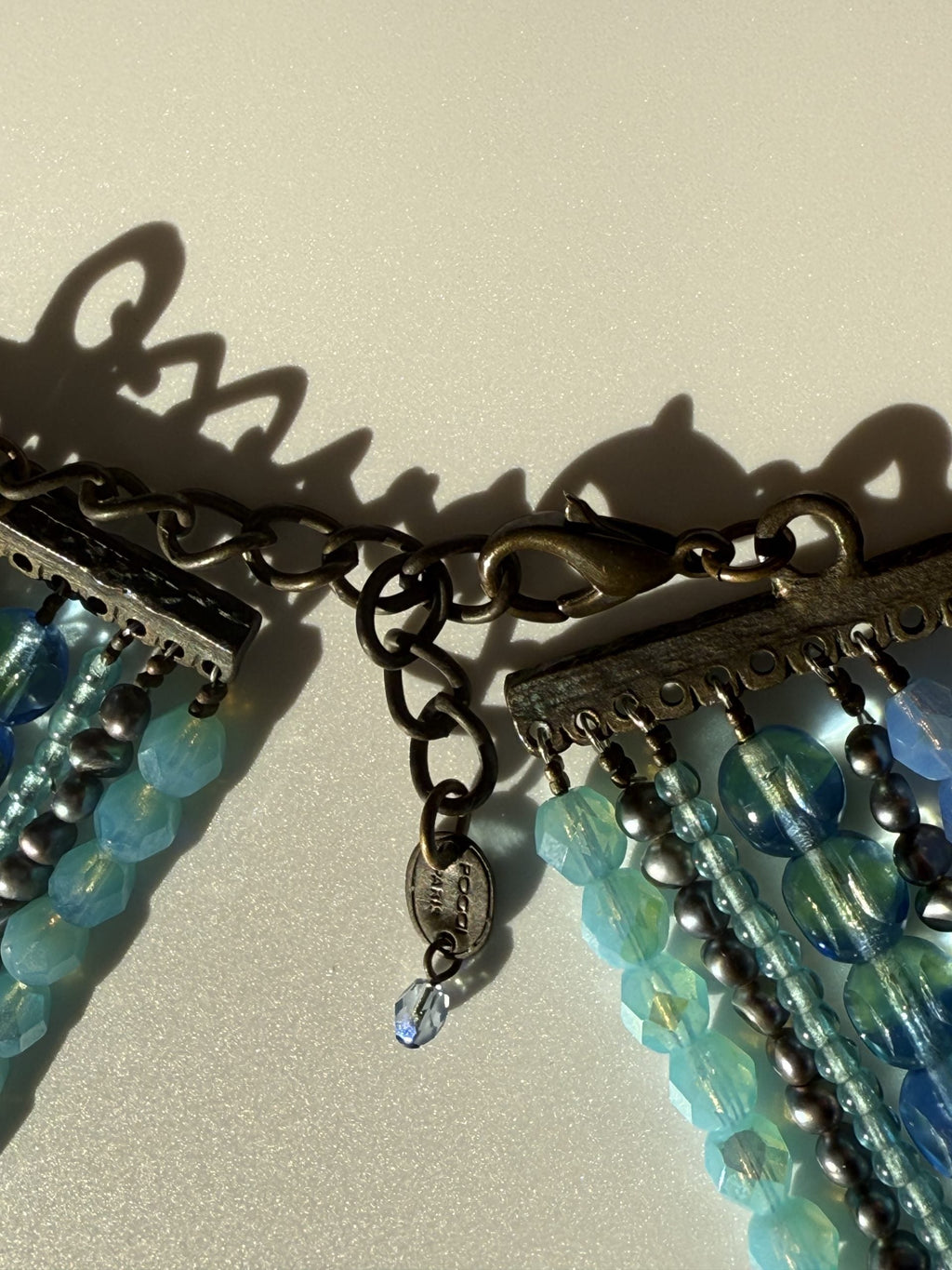 Poggi of Paris – Multi Strand Faceted Blue Beads Collar
